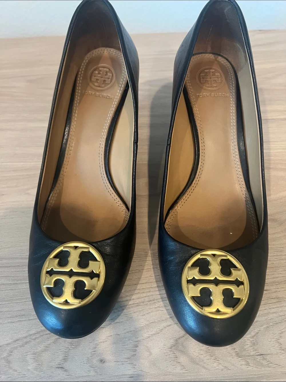 Tory Burch Black Leather Wedge Pumps with Gold Logo Medallion